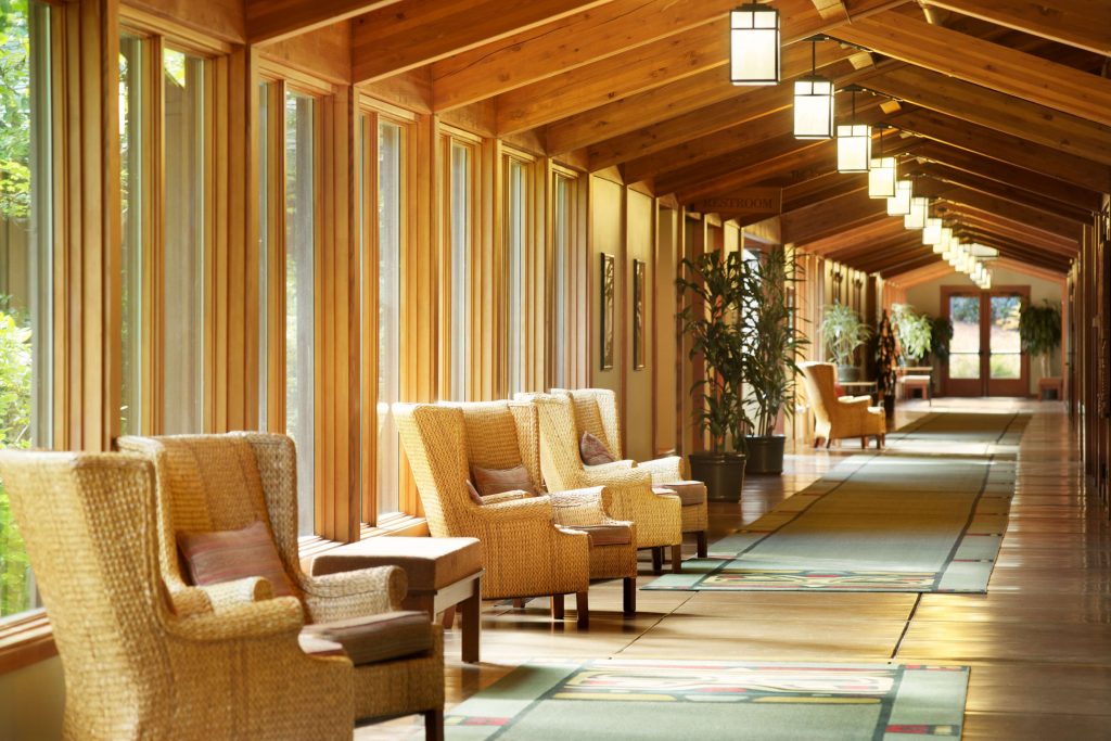 wing backed chairs arranged in pairs in hallway at Skamania Lodge